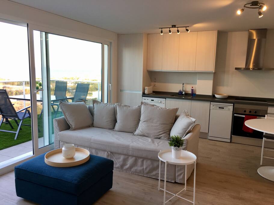 Living area with open kitchen.