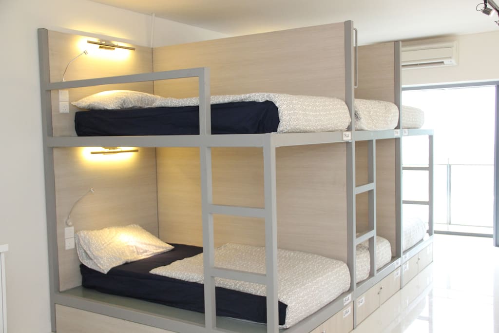 Custom made modern bunk beds with private storage space