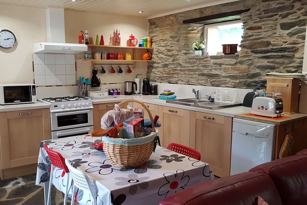 Kitchen - Open Plan, Fully fitted and equipped kitchen with cooker, fridge, dishwasher, microwave, toaster & Kettle. Table seats 4. High Chair is also available. Everything you need is available, crockery, tea & coffee,etc.