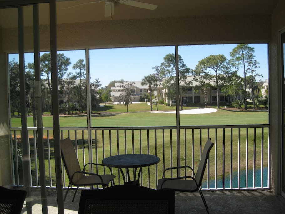 This is your view from your living room,past the lanai to the lake and golf course