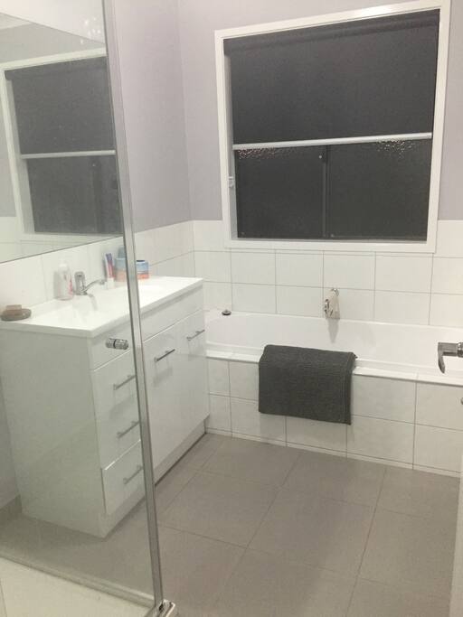 Bathroom with shower and tub