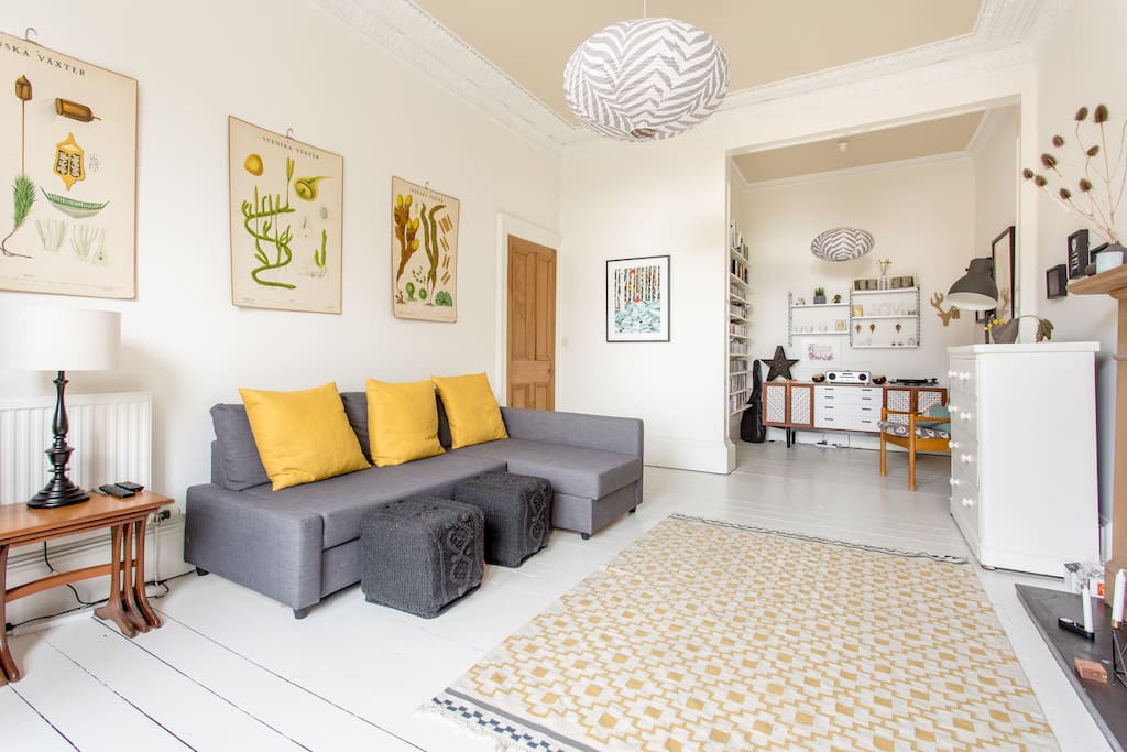 Large, bright living room, with original period features