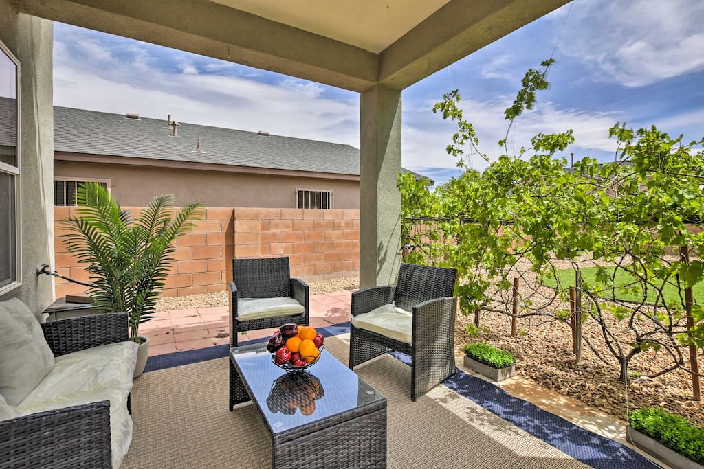 With a shaded patio and beautiful backyard, this property is an outdoor oasis!