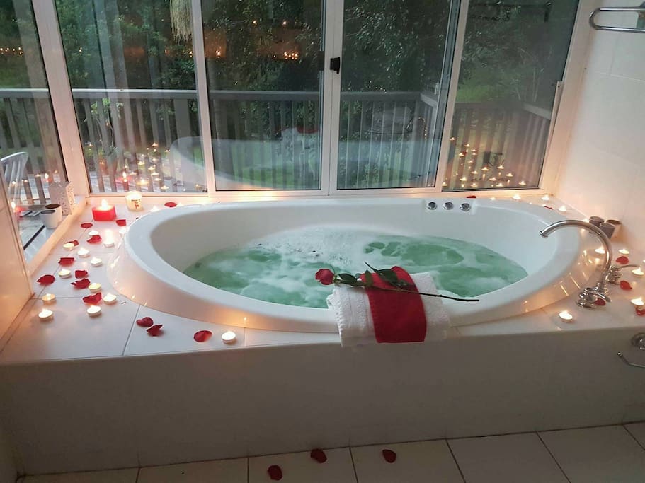 Ensuite bathroom done up as a romantic escape. Ask.