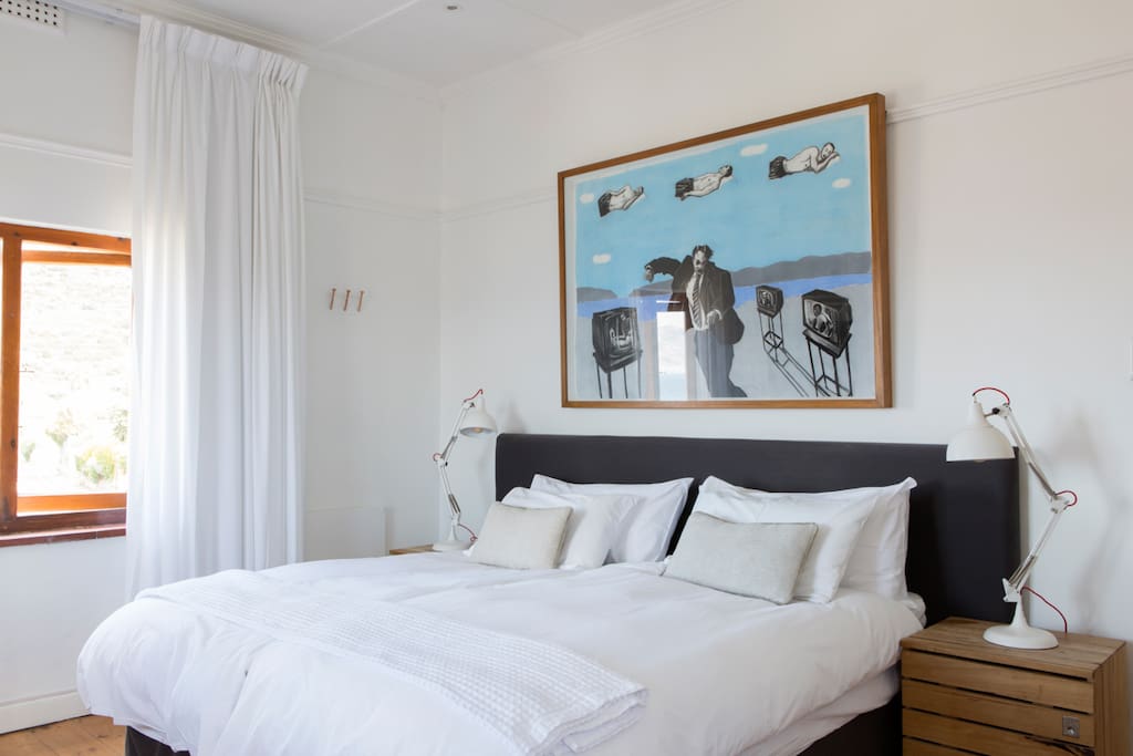 A sunny and natural light filled deluxe room