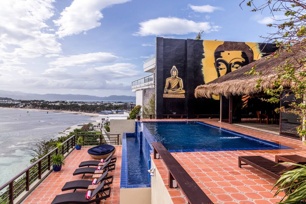 A majestic view of the ocean and the Boracay landscape also showing our exclusive infinity pool and viewing sun deck
