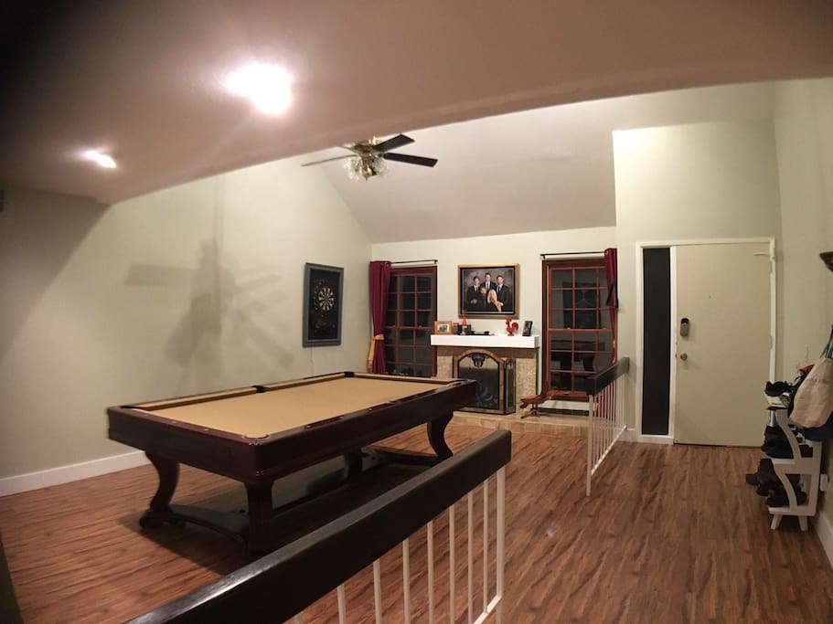 Billiard room. Great view of new flooring throughout house.