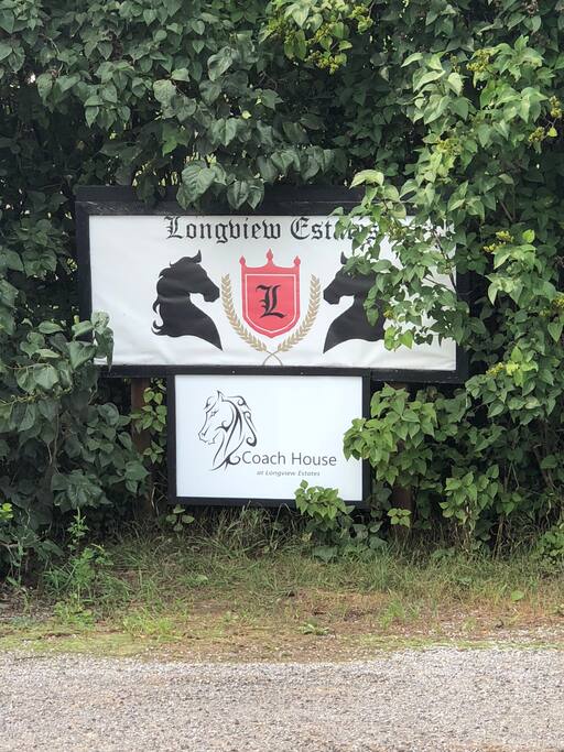 Welcome sign at driveway