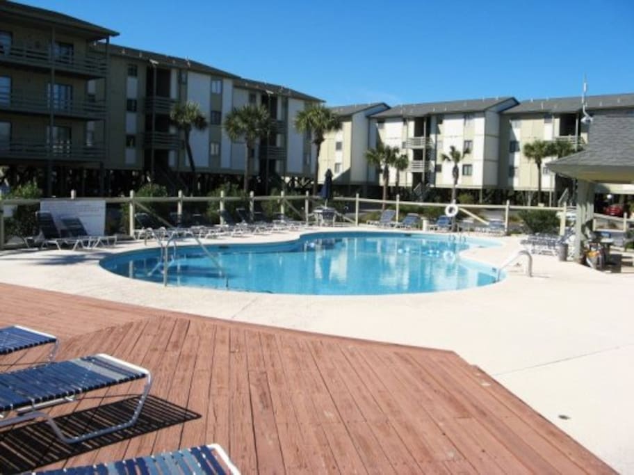 Enjoy spectacular views of the Savannah River entrance & Atlantic Ocean with dolphin, bird & ship watching, 2 full size pools, & a Kiddies` Pool