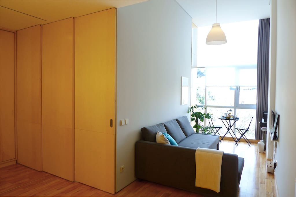 Sliding-doors separate bedroom from living-room