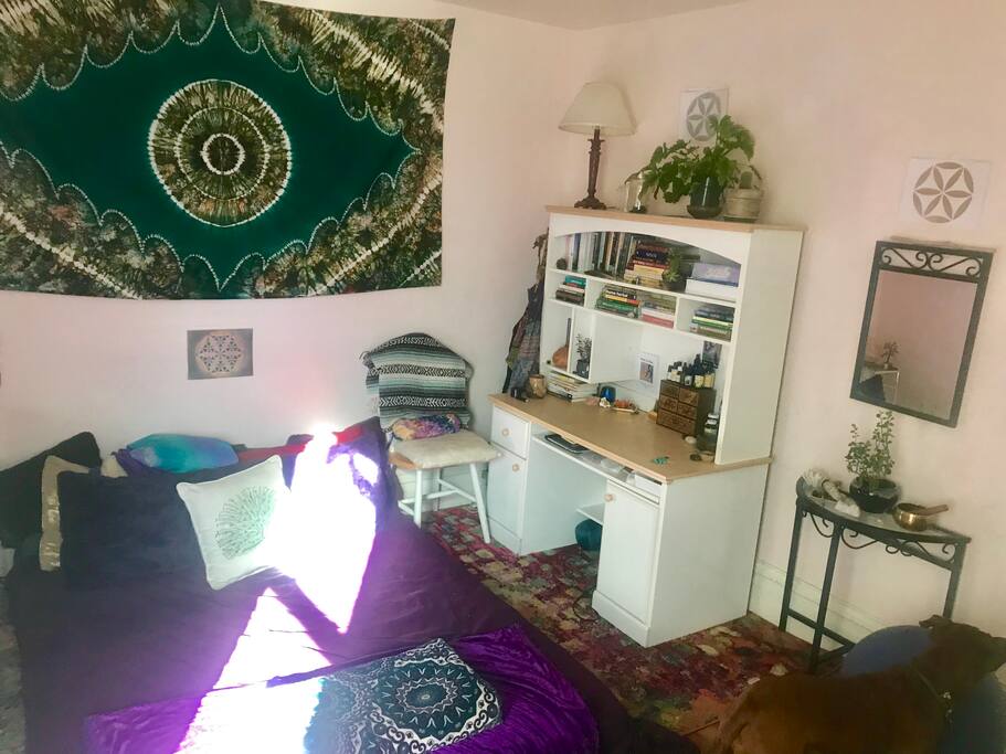 Here is a photo of the guest bedroom. We are re-decorating the room now and will upload more photos soon. Room includes queen size bed and writing desk