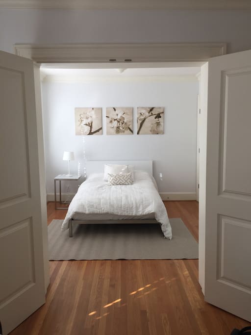 Double doors open up the 1 bedroom space from the living room / open concept space