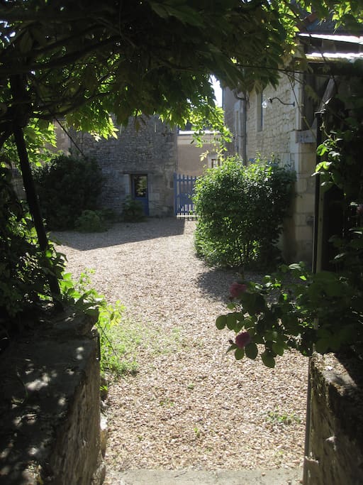 The property is made of 3 buildings with this courtyard in the centre.