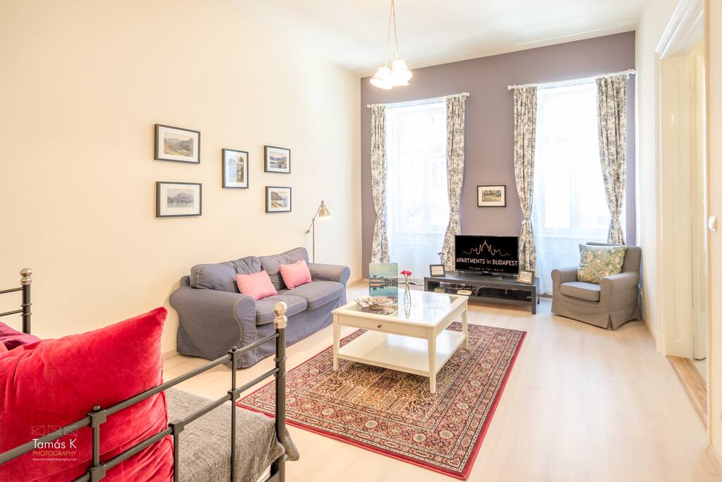 Spacious living room with double sofa bed, flat screen TV and free Wifi