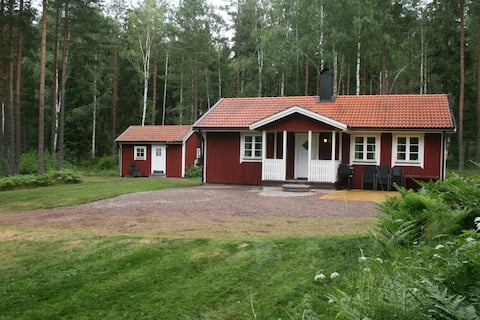 Private cottage in the woods with a wood-fired sauna.