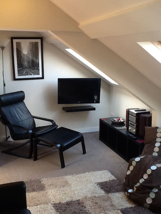 Lounge area with TV and Hi Fi