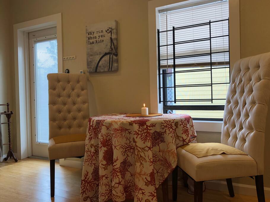 Dining seating for two or just relaxing by fresh breeze through the window