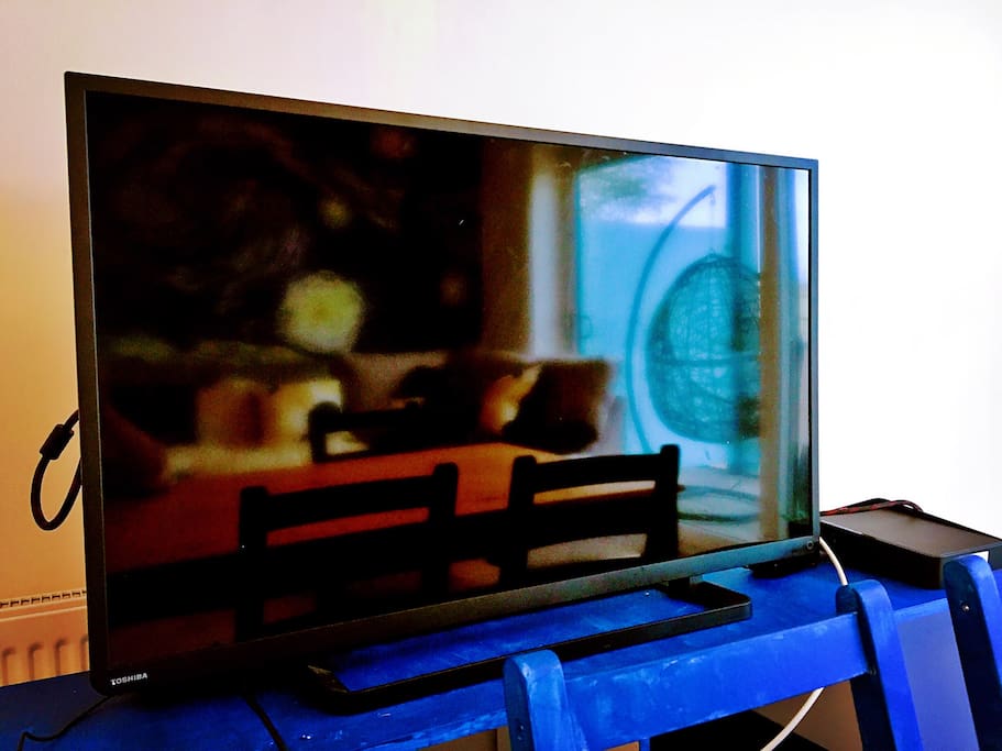 A modest TV informs me how the earth is grown so small, ringed in spice routes of connectivity