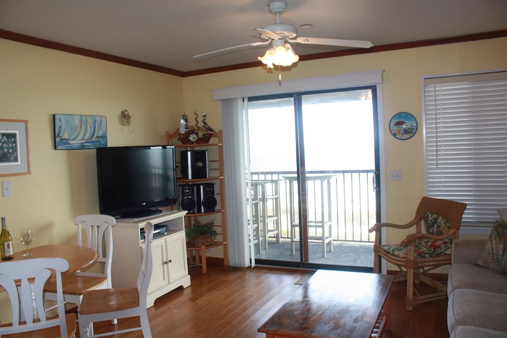 Living Room with Flat Screen TV, DVD Player, and of course a great view of the ocean.