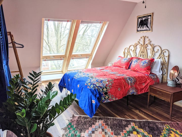 Bedroom #4: "The Panther Room" on the upper floor with queen sized bed and skylights