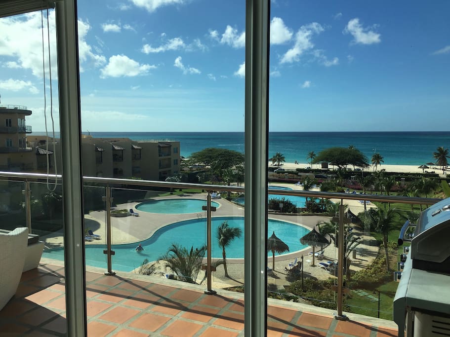 View of the pools and beach from the living room