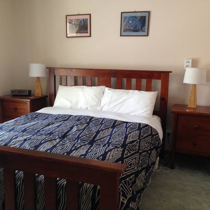 Queen bed in main bedroom