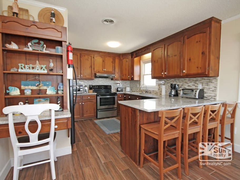 Kitchen - Fully equipped, open to dinning and living rooms
