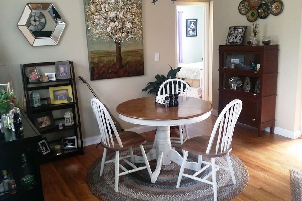 Dining area across from living room setup