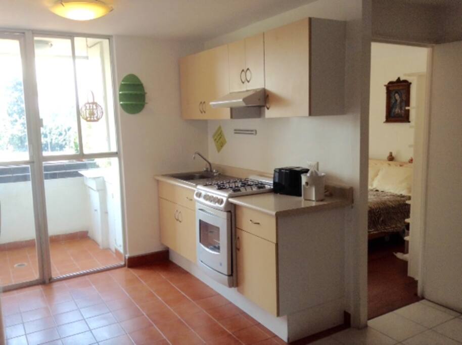 Agradable y completa cocina.