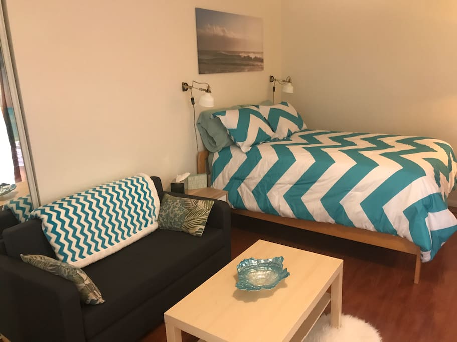 Living space and bed.