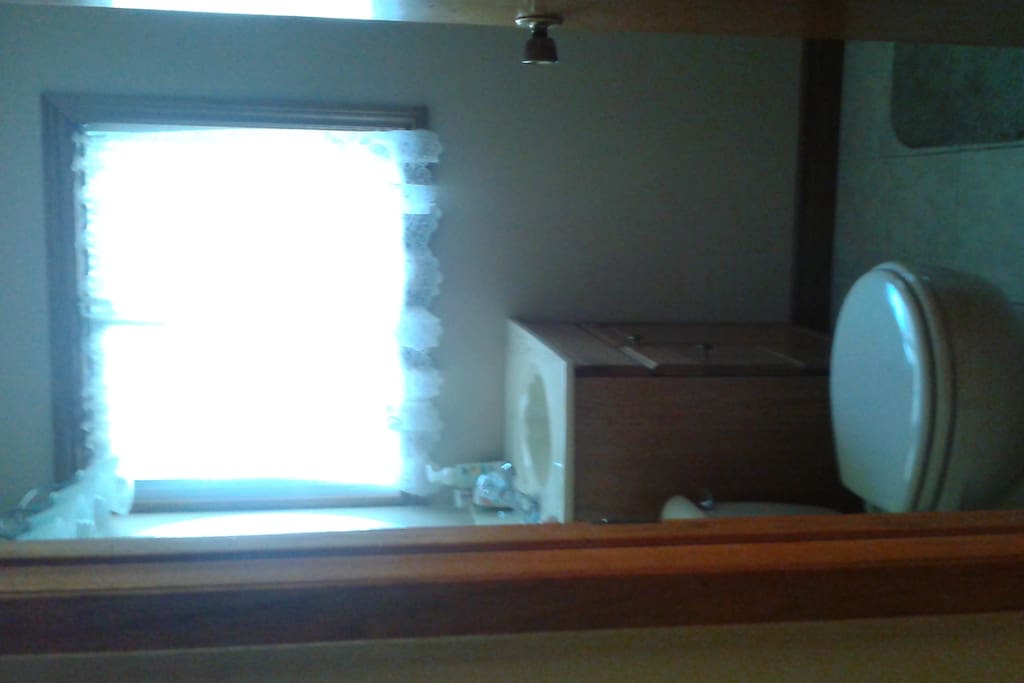 Washroom with a sink, toilet and shower