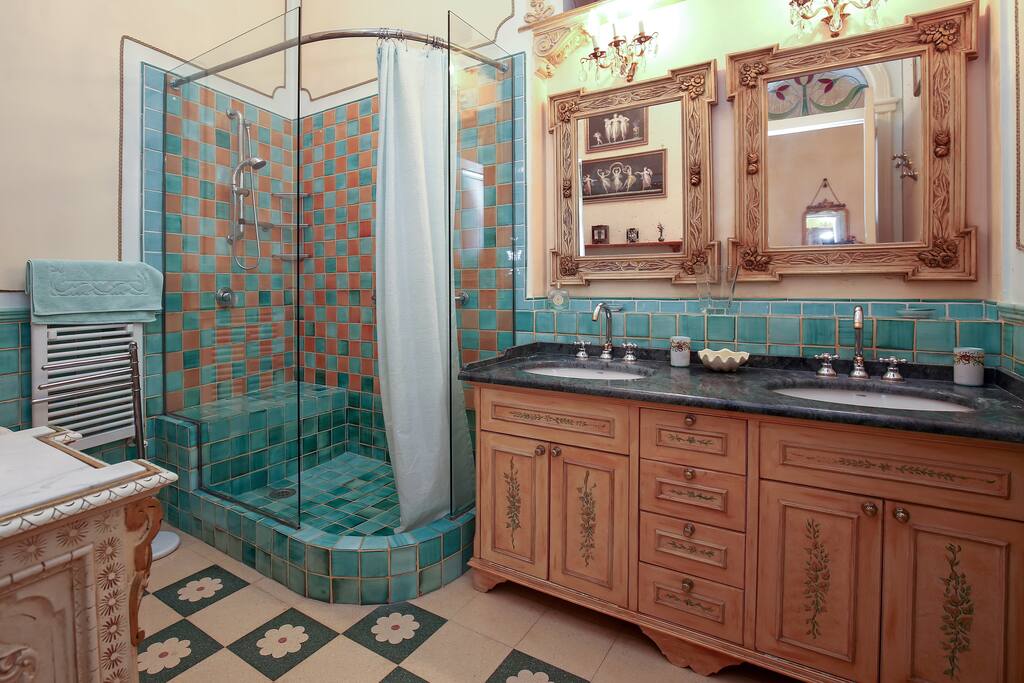 The master bathroom ensuite with big shower made with handmade vietri ceramics
