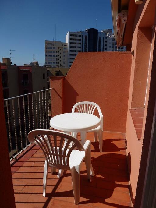 Small balcony leading from living room