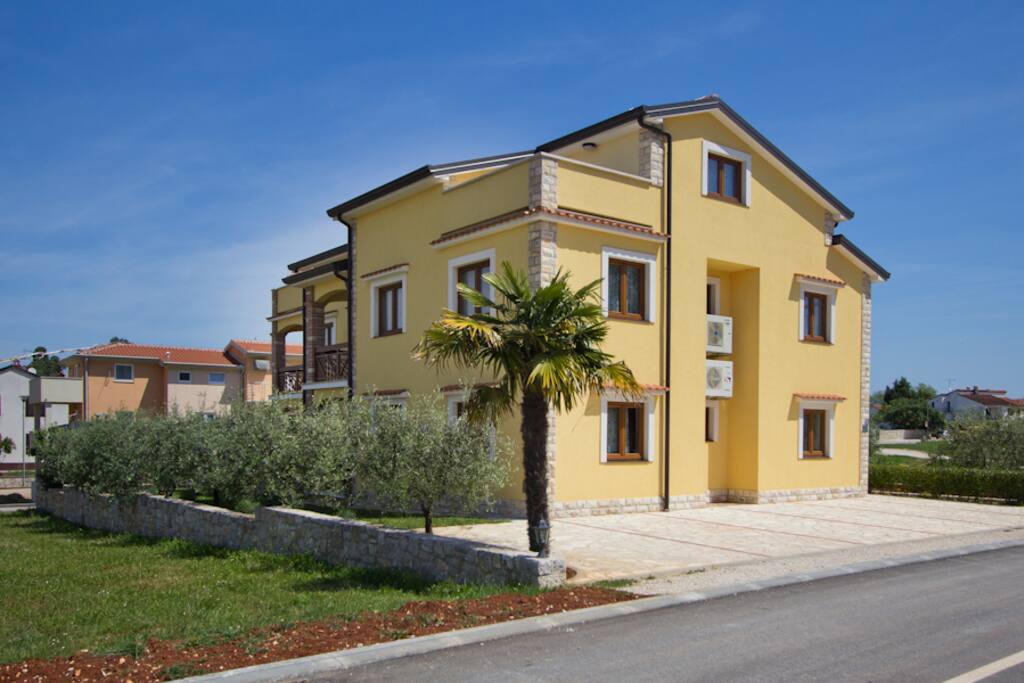 Apartment house and parking space