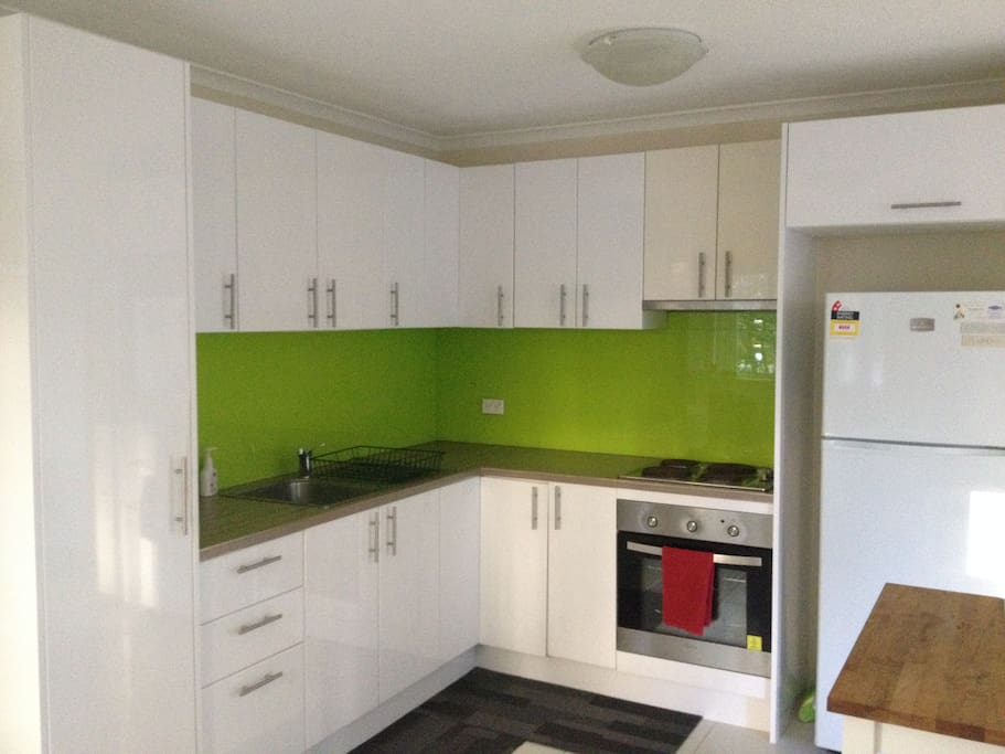 Fully equipped kitchen with dining area