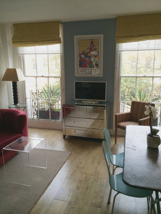 Tall windows make this a bright room.