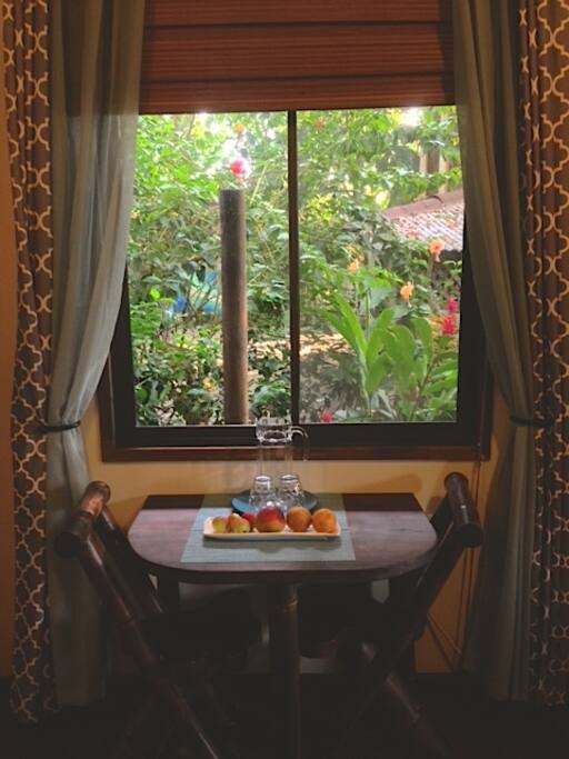The seating area has a combination of cedro wood and black bamboo for a one of a kind look. Hand made and designed by local artisans. Our full length mirrors with rustic edges were also made by a local artist. At checkin you will find a tray of fresh fruit and a pitcher to fill with cold filtered water after your journey, we want you to relax and feel taken care of.