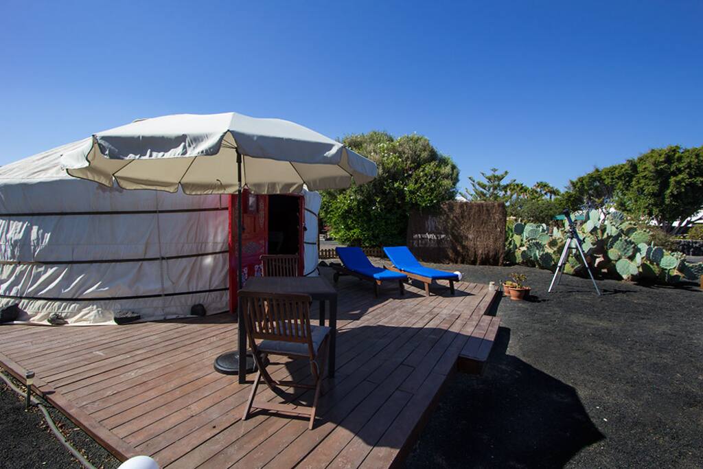 Dining al fresco, parasol for shade, sunbathing with comfy loungers
