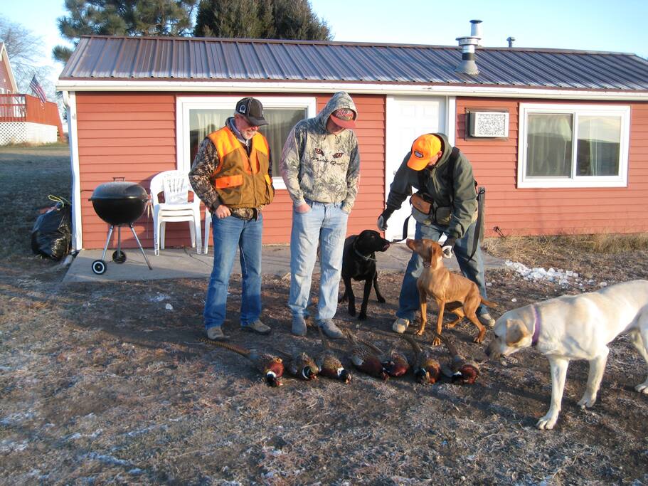 Happy pheasant hunters
