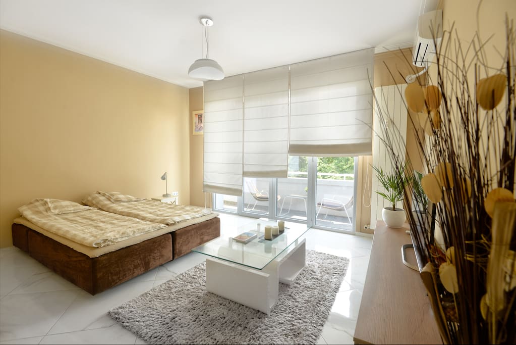 The sofa as queen bed with top mattress