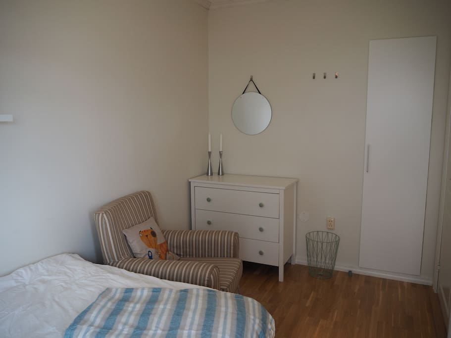 The room also has a dresser for your clothes or belongings.