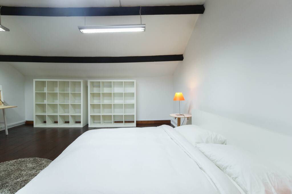 Attic with king-sized bed and sofa bed