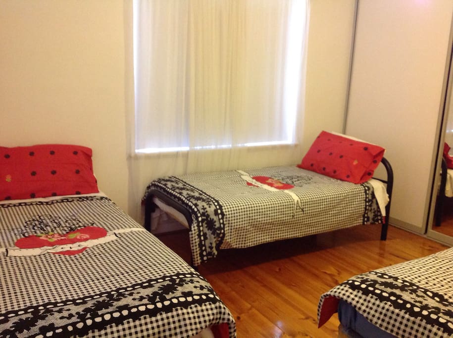 This room can be co figured from 2-3 beds, as shown in this photo we have configured 3 beds for 3 ladies. Bed linen will be changed to accommodate various guest