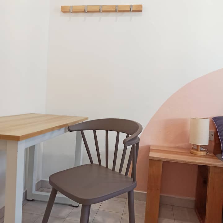 Room 2 with queen bed
-equipped with air conditioner
-bedside table, desk & chair