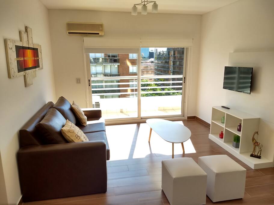 Sofa cama en living.