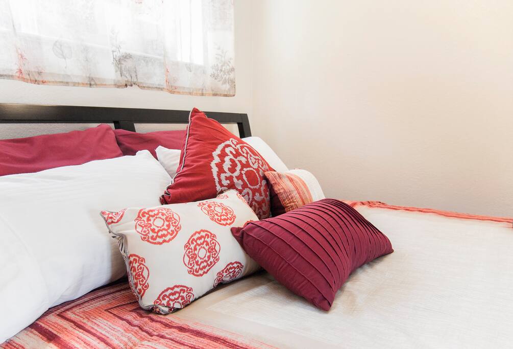 Down pillows and a comfortable mattress for a great night's rest.
