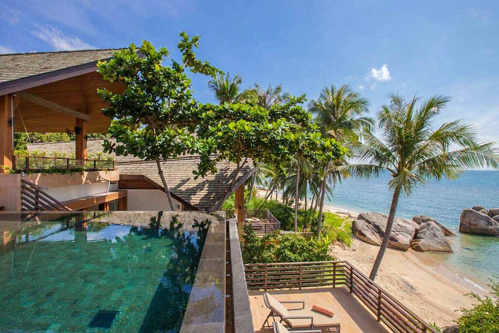 Baan Hinyai is a tropical dream destination that takes the concept of indoor/outdoor living to the next level. Located on the southeast coast of Koh Samui, this villa is located just twenty-six feet from the Namuang waterfall and a ten minute drive from the town of Lamai. For groups up to ten, the elegant blend of modern design and Thai charm make Baan Hinyai an ultimate beachside villa.