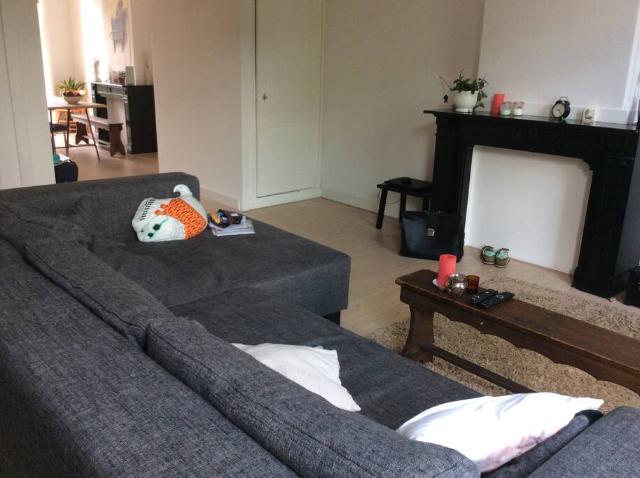 Large living room with our huge sofa for a good movie night at home