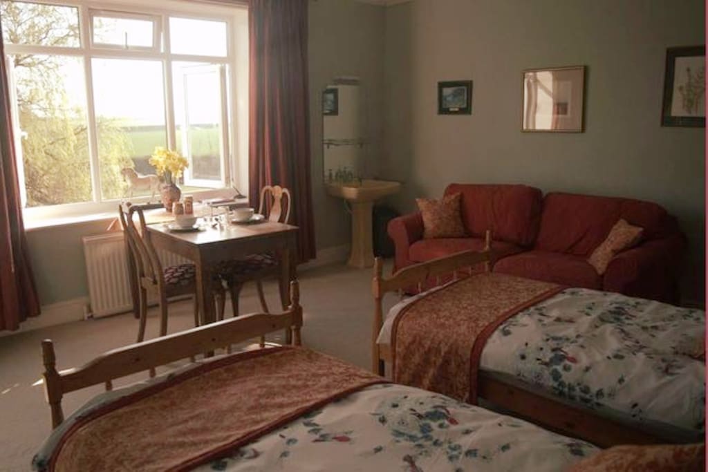Enjoy your breakfast in this peaceful south east facing room, overlooking paddocks and gardens