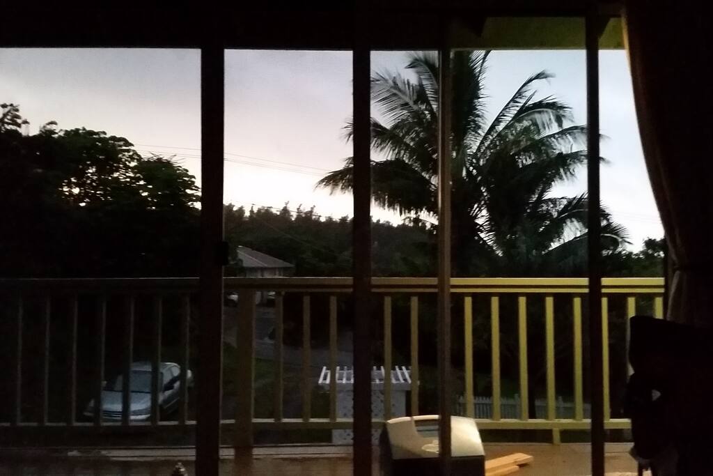 Looking west through the slidin glass doors and deck